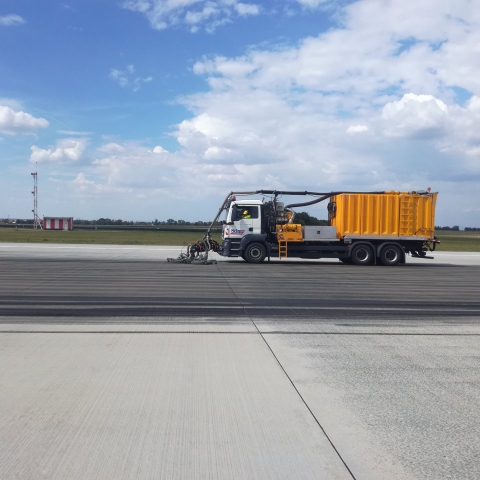 Airport runway rubber removal